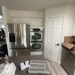 a kitchen with stainless steel appliances
