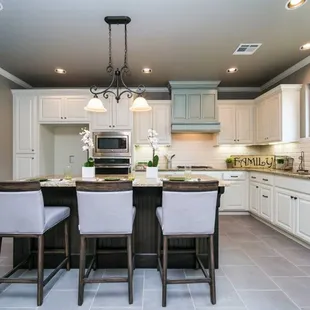 well lit kitchen with bar interior