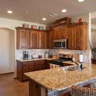 interior kitchen with wooden cabinets