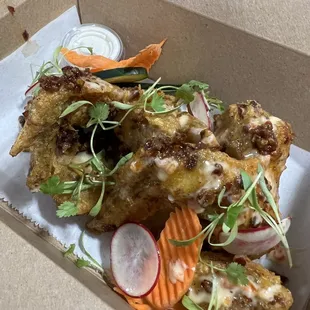 Fried Chicken Wings with a choice of Garlic Chili or Honey Mango Chipotle