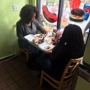 Two customers enjoying 4familybarbque