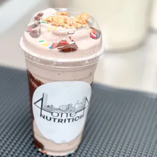 a chocolate milkshake with sprinkles