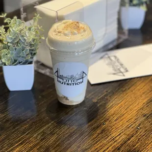 a cup of coffee on a table