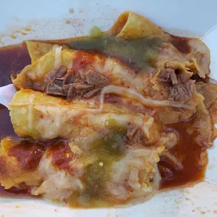 New menu item...Rolled birria tacos with red &amp; green salsa, Muenster cheese, red sauce. Delicious!