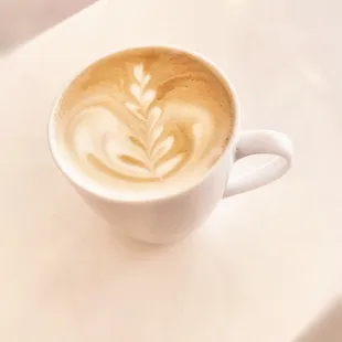 a cup of coffee on a table