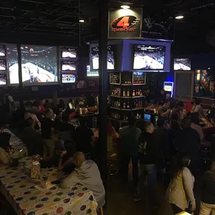 a large group of people sitting at tables