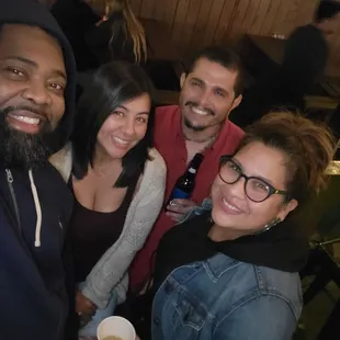 a group of people posing for a picture
