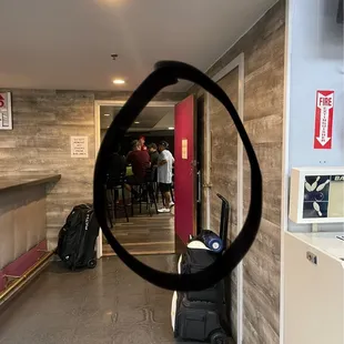 Manager at the bar drinking