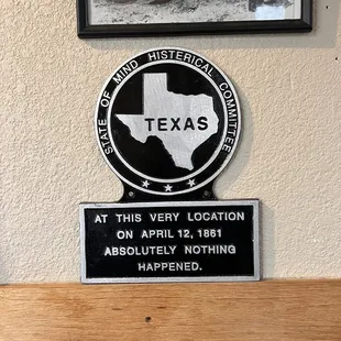 a plaque on the wall