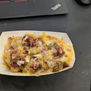 Loaded tots is a joke. $6.49 for a 2"x4" boat that is filled about half way.