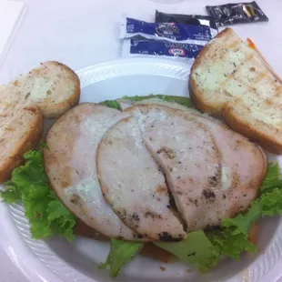 Turkey caprice sandwich .