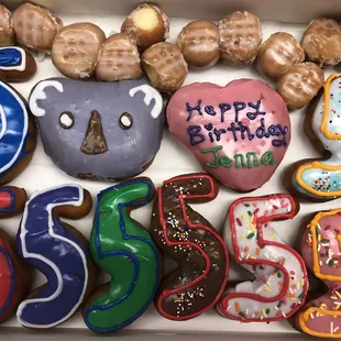 a box of birthday donuts