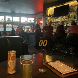 people sitting at a bar