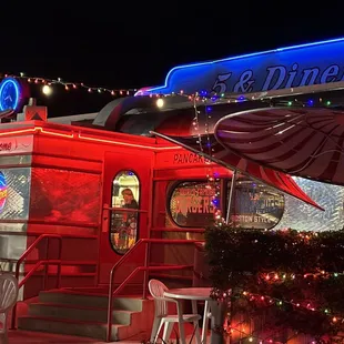 the outside of a diner at night