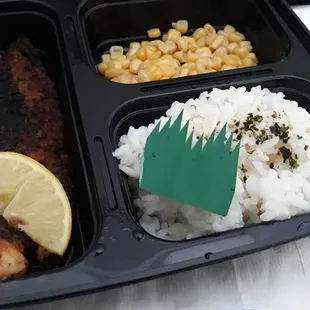 Cajun snapper. Includes rice and corn.  $5