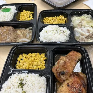 Hamburger steak, kalua pig &amp; cabbage, &amp; shoyu chicken bentos