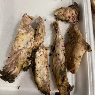 chicken wings in a styrofoam container
