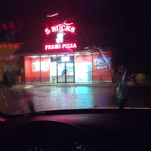 a neon sign on a building