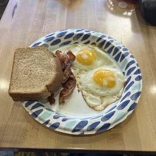 $5 breakfast. Two eggs, choice of protein or hash browns &amp; toast.