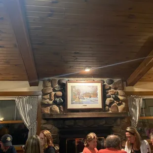 a group of people sitting around a table