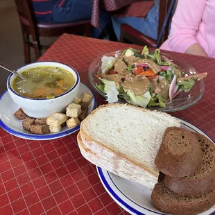 Lemon Chicken Soup, house salad with balsamic, and two bread types.