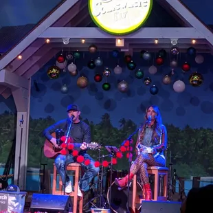 three people on stage