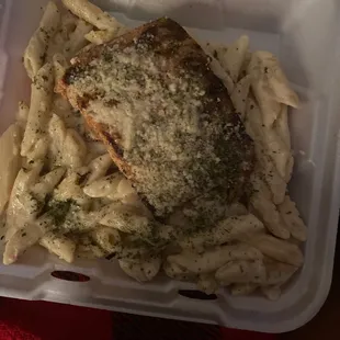 a meal in a styrofoam container