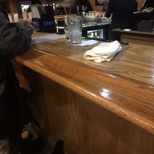 a bar with a wooden bar top