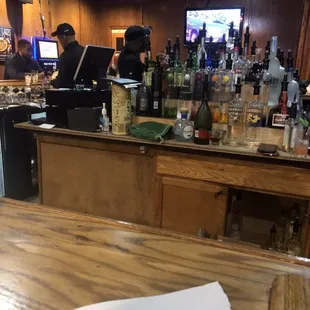 a bar with a lot of bottles