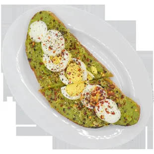 Avocado Toast, Boiled Egg, and Red Crushed Pepper.