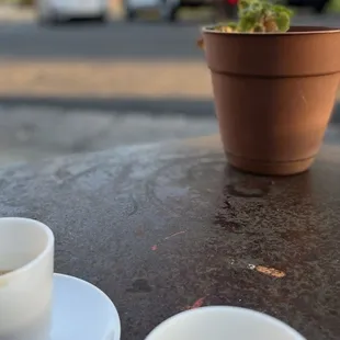 two cups of coffee on a table