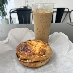 Jalapeño cheese bagel with cream cheese and a Vietnamese iced coffee.