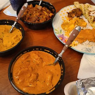 Butter Chicken and Chili Chicken served with basmati rice. Gobi Manchurian (spicy cauliflower) is terrific. Gulab Jamun is yummy.