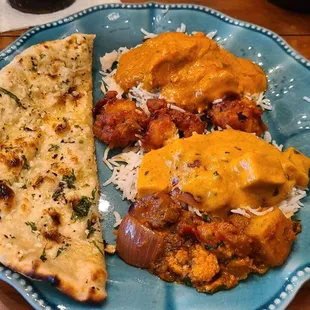 Garlic Naan, Butter Chicken, and Chili Chicken was delicious.