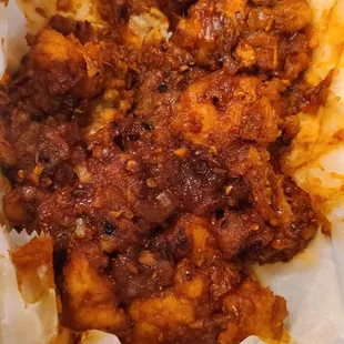 Gobi Manchurian is a sweet and spicy cauliflower with scallion ginger sauce. We loved it.