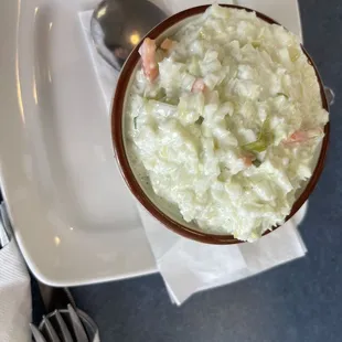 a bowl of rice and a spoon