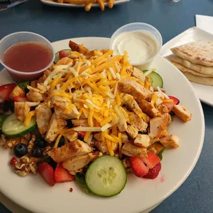 Amazing Dila Salad, always fresh ingredients. Veggies, fruits, nuts, cheese. Choose to add chicken, YES PLEASE !
