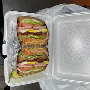 Club Sandwich with cheese, add an egg and mustard