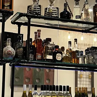Full tequila bar at hour service.