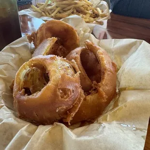 Fries (back), onion rings (front)