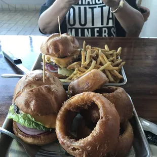 Burgers, fries, onion rings.