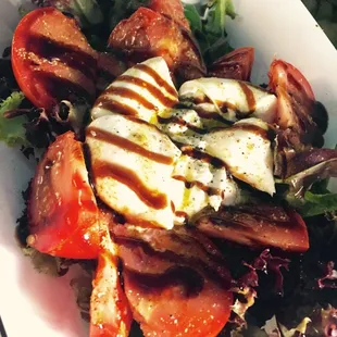 Caprese with fresh Burrata cheese, balsamic reduction and basil oil