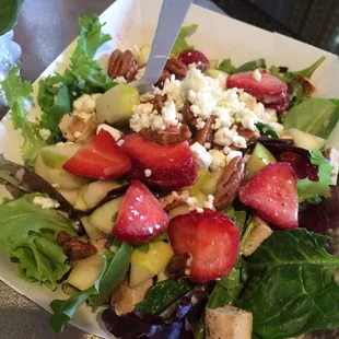 Strawberry salad with added grilled chicken for an extra $4. Very tasty and fresh.