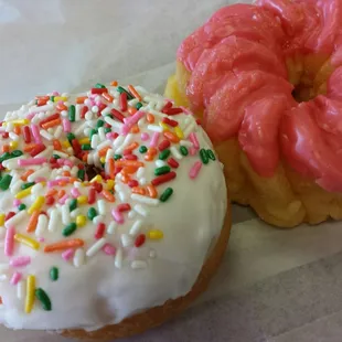 two doughnuts with sprinkles