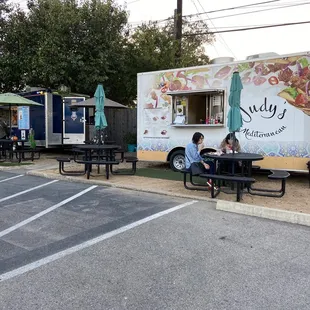 a food truck parked in a parking lot