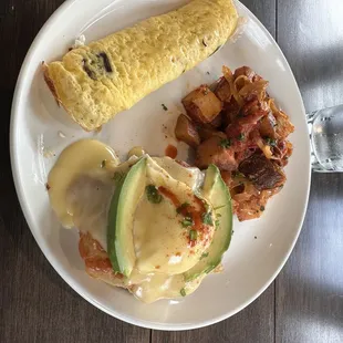 Eggs Benedict, omelet and house potatoes