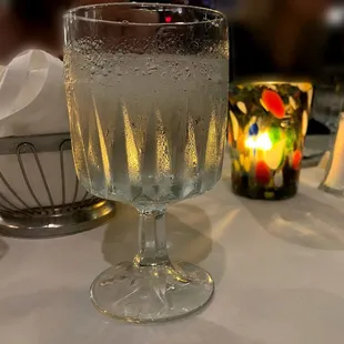 a glass of water on a table