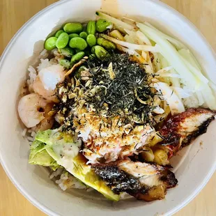 an overhead view of a bowl of food