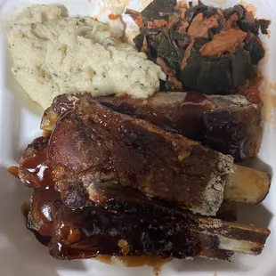 Rib plate with cauliflower mash and collard greens/ kimchi