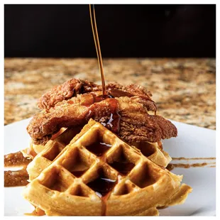 a plate of fried chicken and waffles